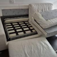 Divano letto in pelle di caribù con pouf