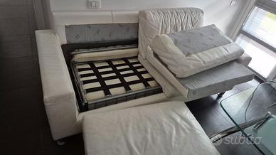 Divano letto in pelle di caribù con pouf