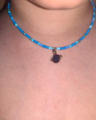 Collana artigianale perline con pianeta blu