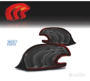 FANALI PER PEUGEOT 208 12-15 LIGHT BAR ROSSO FUMÉ