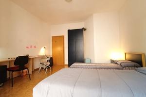 Stanza doppia ad uso singolo con balcone da magg