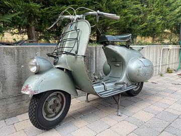 Vespa 125 faro basso “vacanze romane”