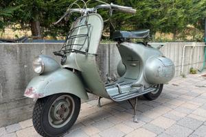Vespa 125 faro basso “vacanze romane”