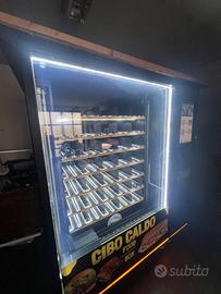 Distributore automatico scalda cibo