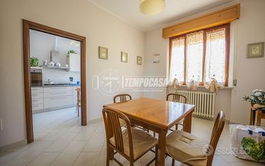 Quadrilocale in bifamiliare con giardino privato