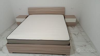 Camera: 2 letti, rete, materasso e comodini