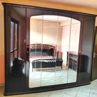 Camera da letto in noce laccato