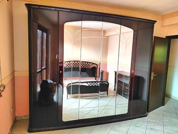 Camera da letto in noce laccato