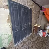 Portone fine 1800 a tre ante.