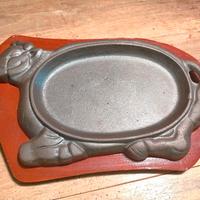 Antico scaldavivande in ghisa.