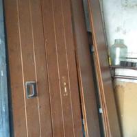 portone sezionale in legno