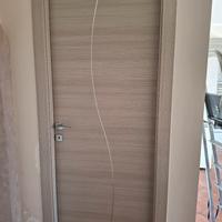 3 porte due scorrevoli  e una a battente