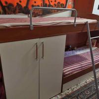 Letto a castello con armadio integrato