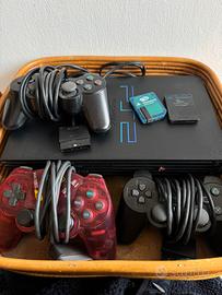 Console ps2 + controller + memory + cavi + giochi