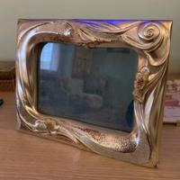 Cornice in metallo rodiato