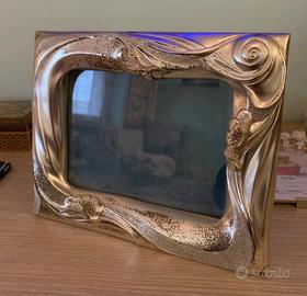 Cornice in metallo rodiato