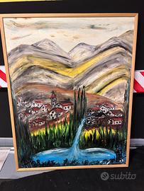 Paesaggio di montagna con villaggio e cascata