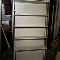 Libreria con letto singolo a scomparsa