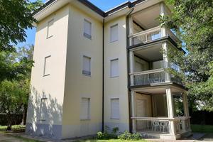 Appartamento con Terrazzo Abitabile e Posto Auto