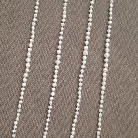 4 fili di perle con orecchini