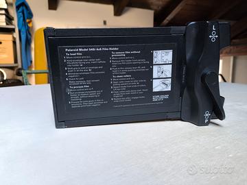 Dorso Polaroid 4x5 modello 545i + 15 Polaroid 45 