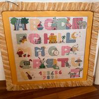 Quadro a punto croce con cornice in rafia