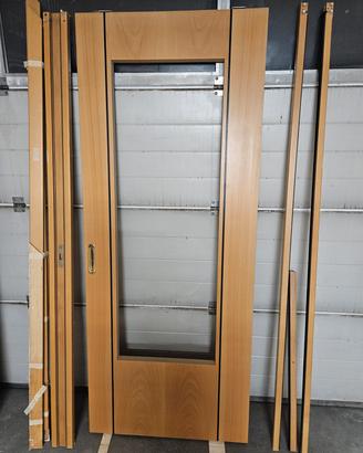 porte scorrevoli e finestra in legno