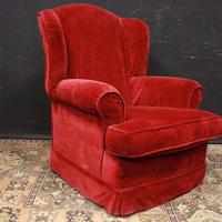 Poltrona in velluto rosso nuova da esposizione