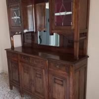 Soggiorno-credenza tavolo sedie divani letto