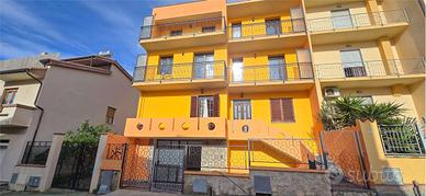 Luminoso quadrilocale con posto auto coperto