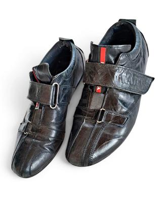 Sneakers in pelle nera Prada