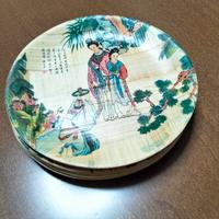 Set piatti in bambù intrecciato vintage.