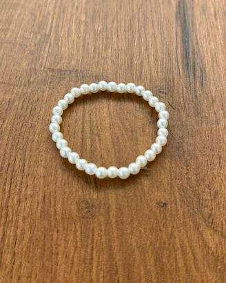 Braccialetto di perline sintetiche bianche