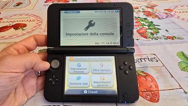 Nintendo 3DS XL Rosso + Mario Kart 7 + Caricatore 