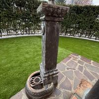 Fontana in ghisa per giardino.