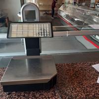 Bilancia elettronica con spellicolatore a rotolo