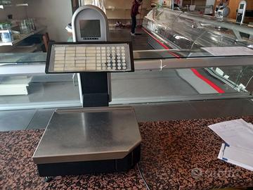 Bilancia elettronica con spellicolatore a rotolo