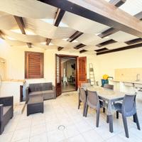 Appartamento piano terra con ampia veranda e posto