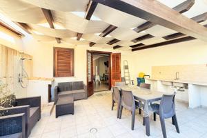 Appartamento piano terra con ampia veranda e posto