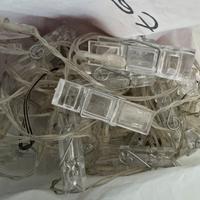 Filo con mollette trasparenti con lucine