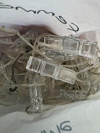 Filo con mollette trasparenti con lucine