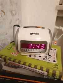 radiosveglia con proiezione orario a parete