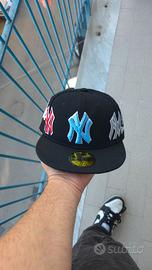 Berretto new era x supreme