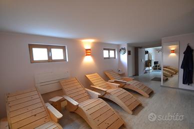 lettini in legno per sauna o giardino