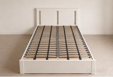 Letto matrimoniale bianco con cassetti contenitore