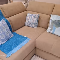 Divano letto angolare con penisola contenitore