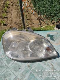 Faro anteriore SX Chevrolet Nubira