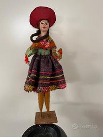 Bamboline in ceramica e stoffa realizzate a mano