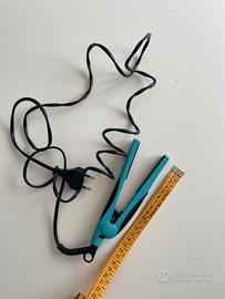 Mini piastra da viaggio azzurra/nera DPE