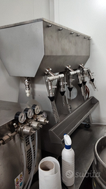 Riempitrice 6 becchi manuale